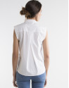White shirt with blue print