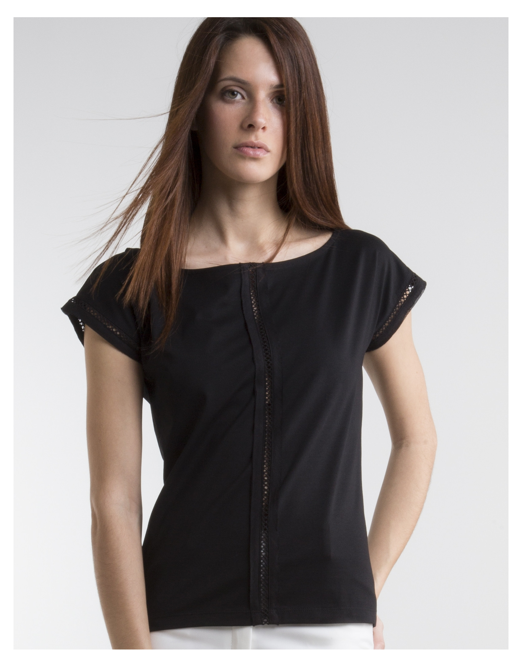 Black top with decorative panel