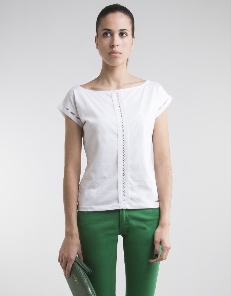 White top with decorative panel
