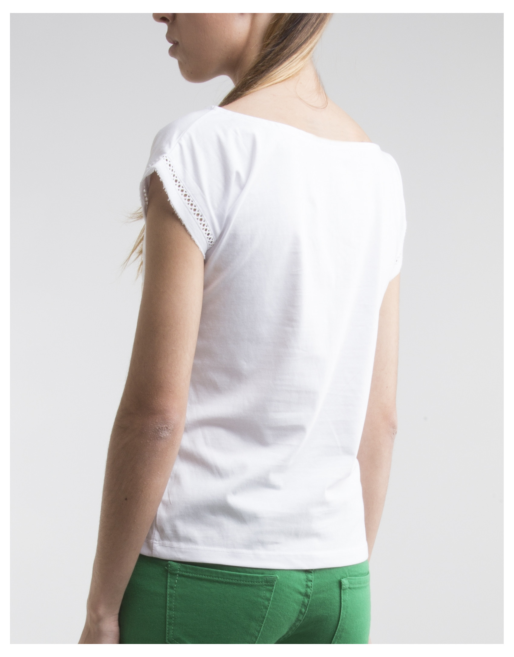 White top with decorative panel