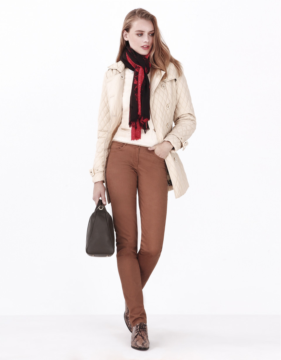 Beige quilted trench coat