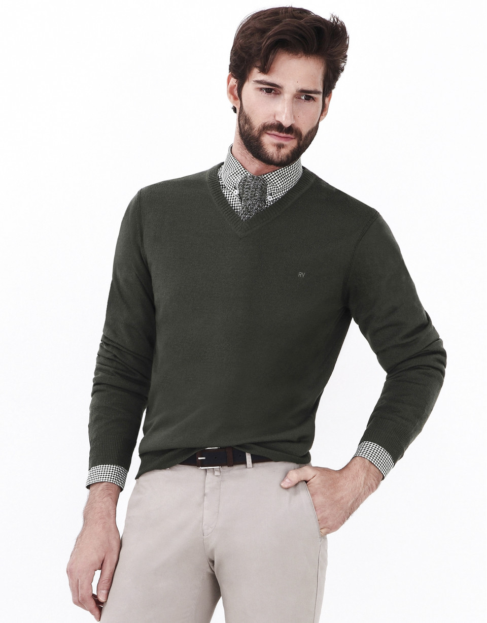 Green V-neck sweater