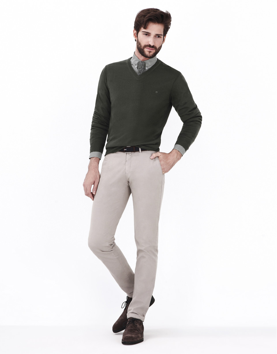 Green V-neck sweater