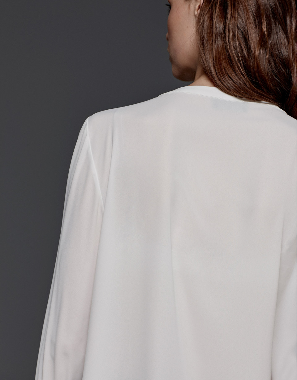 Blusa jaretas crudo
