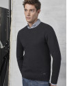 Navy blue sweater with green design