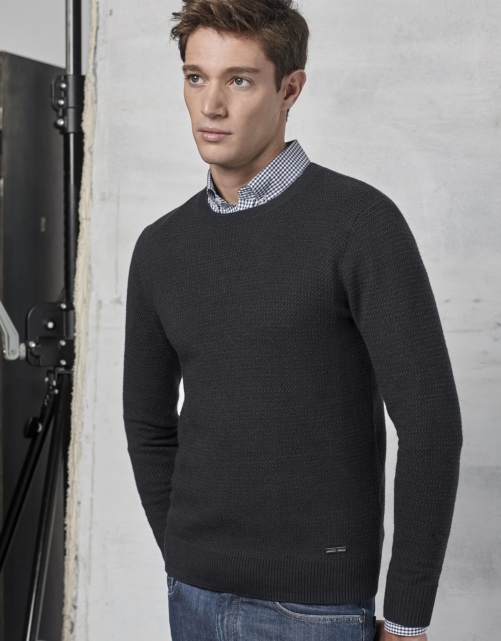 Navy blue sweater with green design
