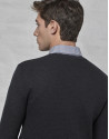 Navy blue sweater with green design