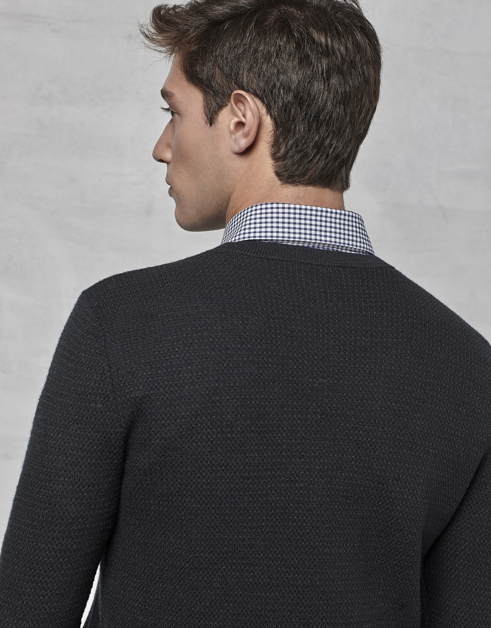 Navy blue sweater with green design