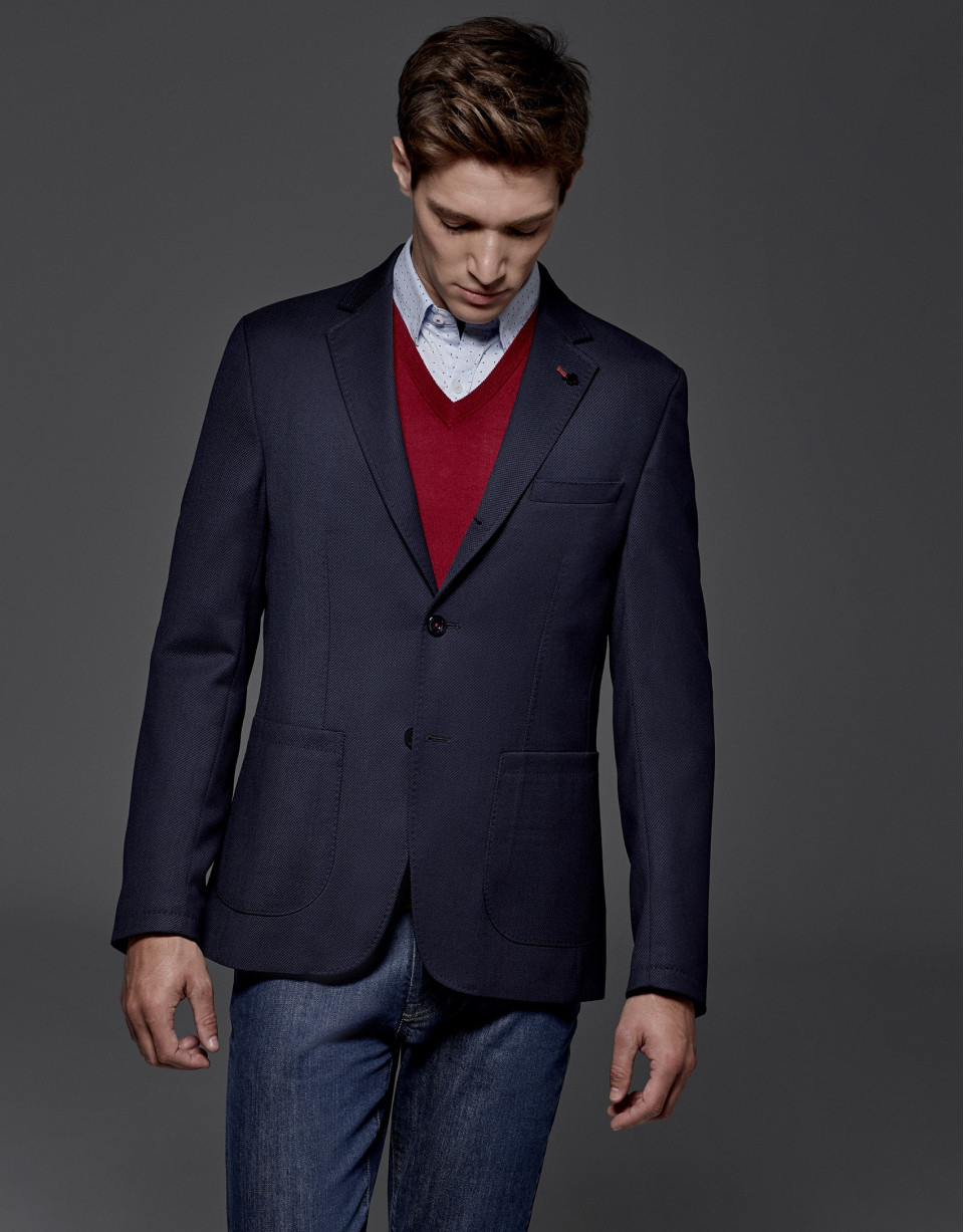 Americana azul marino con bolsillos parche