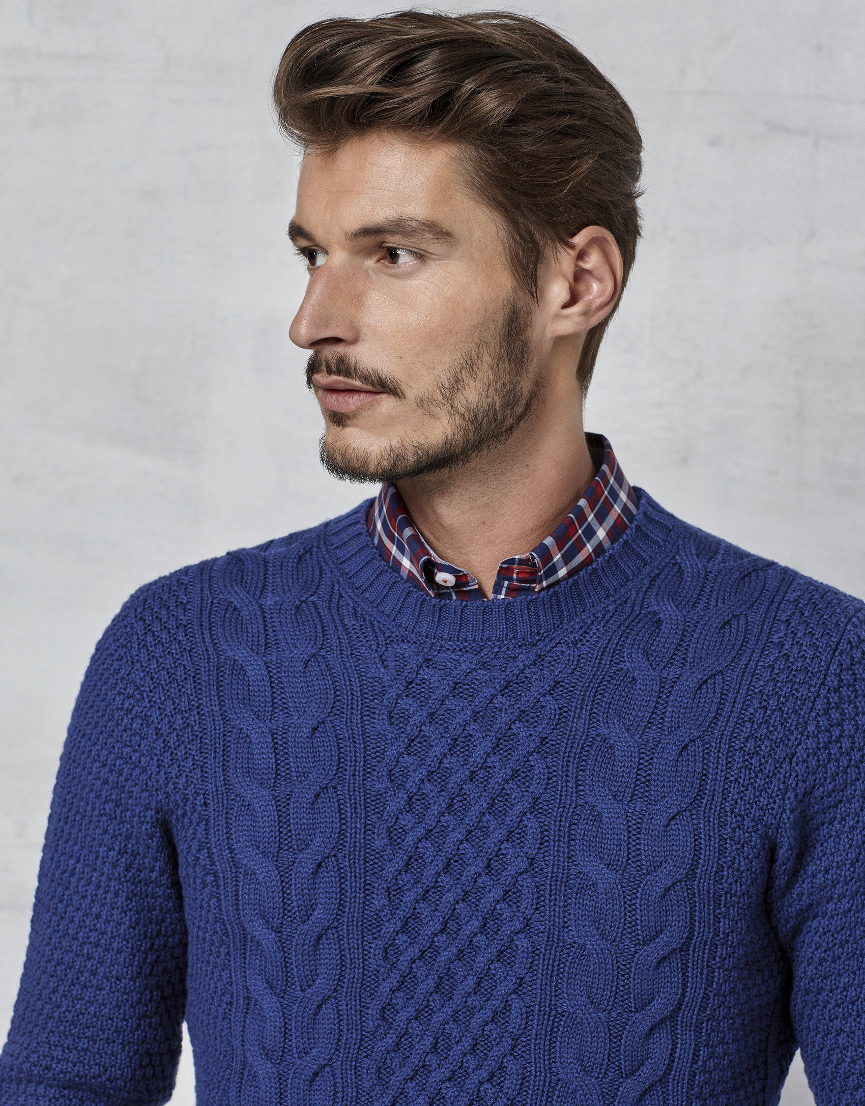 Blue braided and cable-stitched sweater