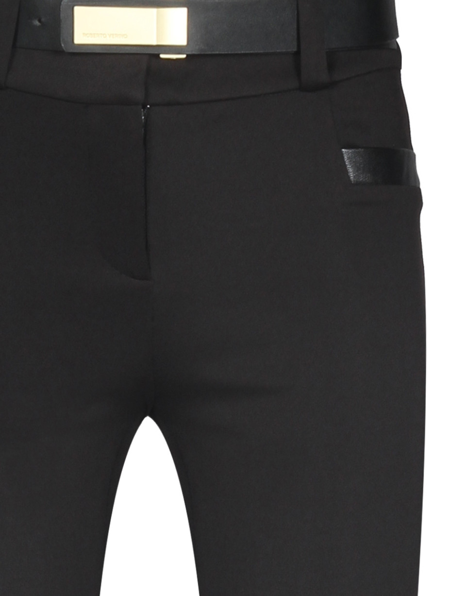 Pantalón en punto negro y apliques en piel 