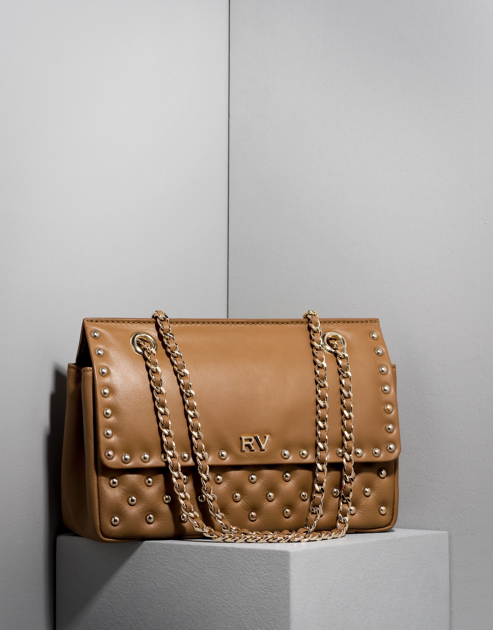 Bolso Ghauri beige con metálicas
