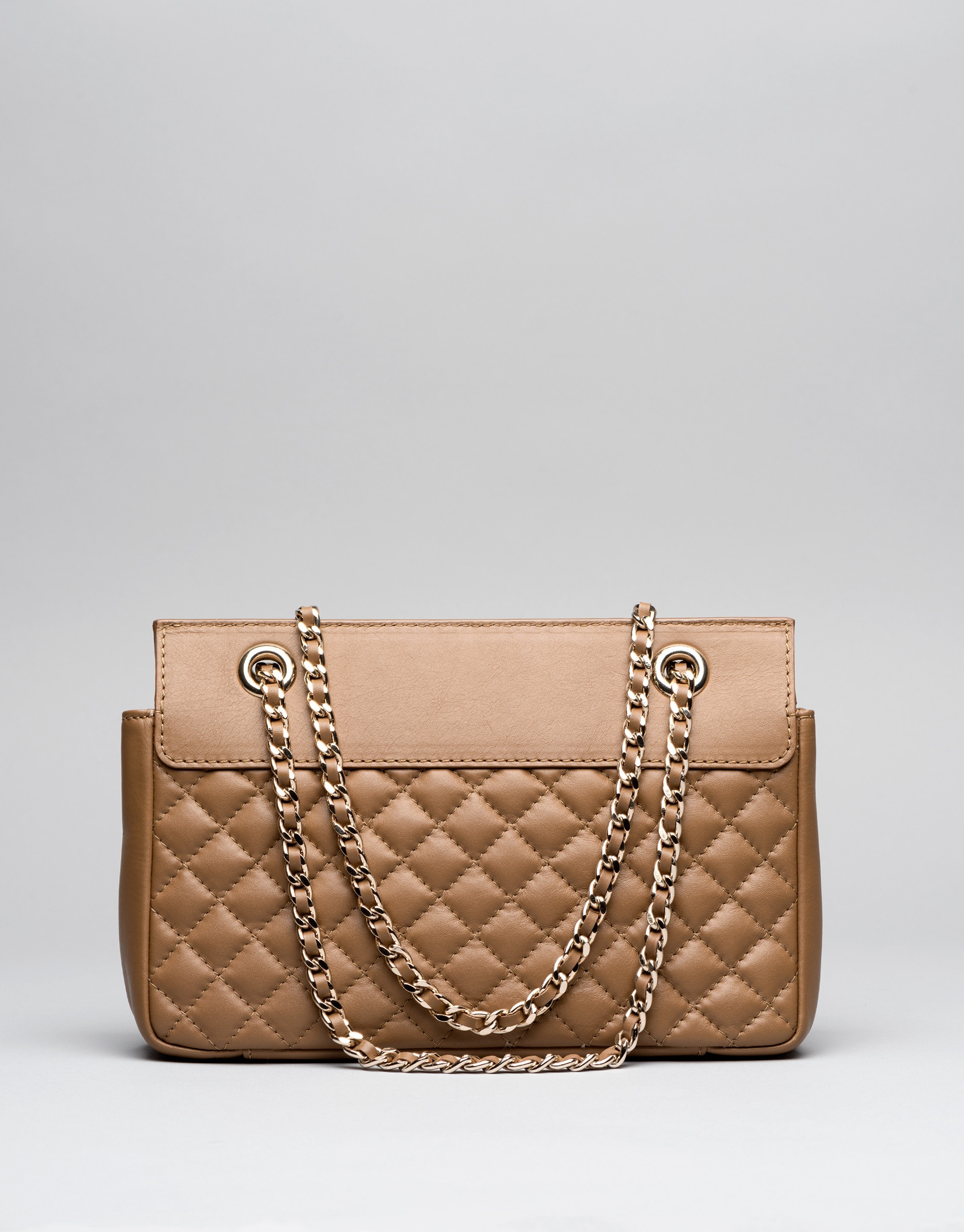 Bolso Ghauri beige con metálicas
