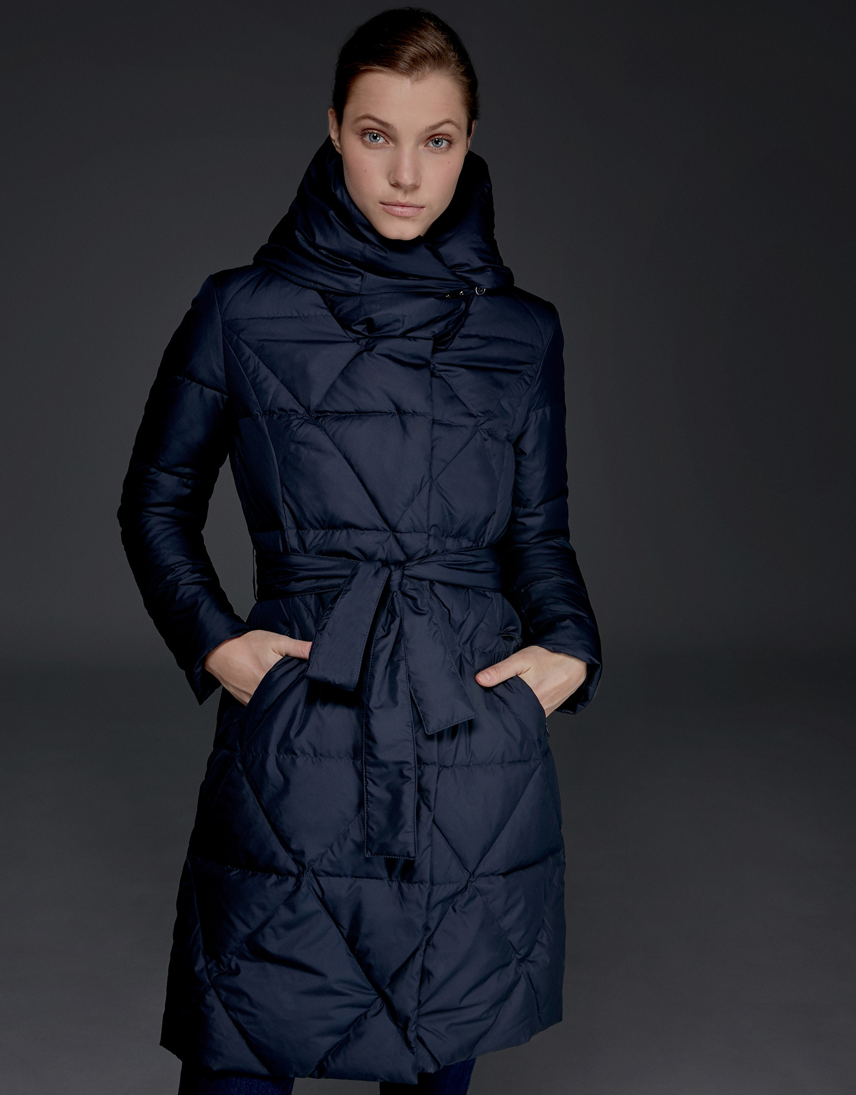 Long navy blue quilted ski jacket