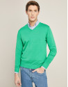 Green V-neck sweater