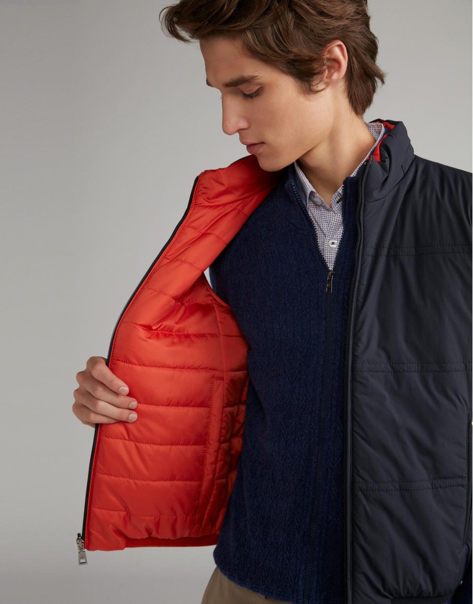 Orange/navy blue reversible vest