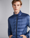 Blue tech ski jacket with details on zippers