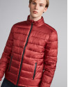 Burgundy tech ski jacket with details on zippers