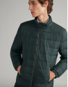Khaki tech ski jacket with details on zippers