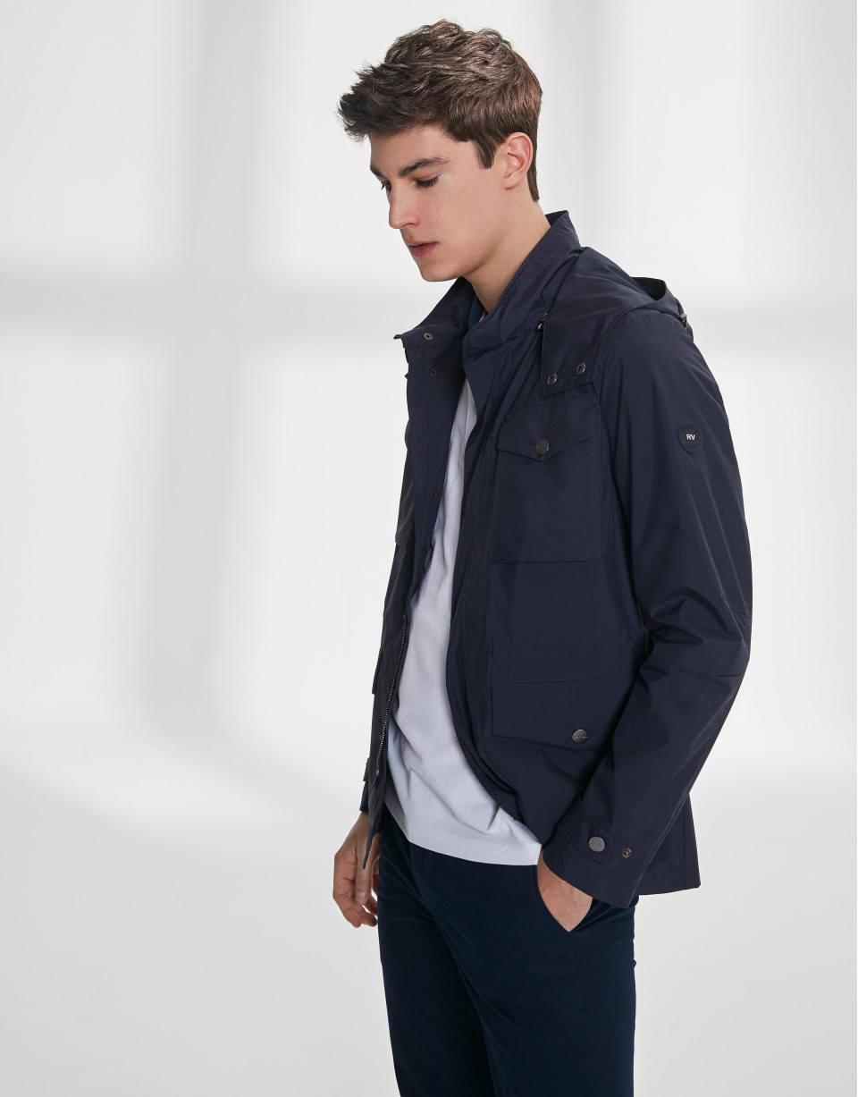 Navy blue parka with four pockets