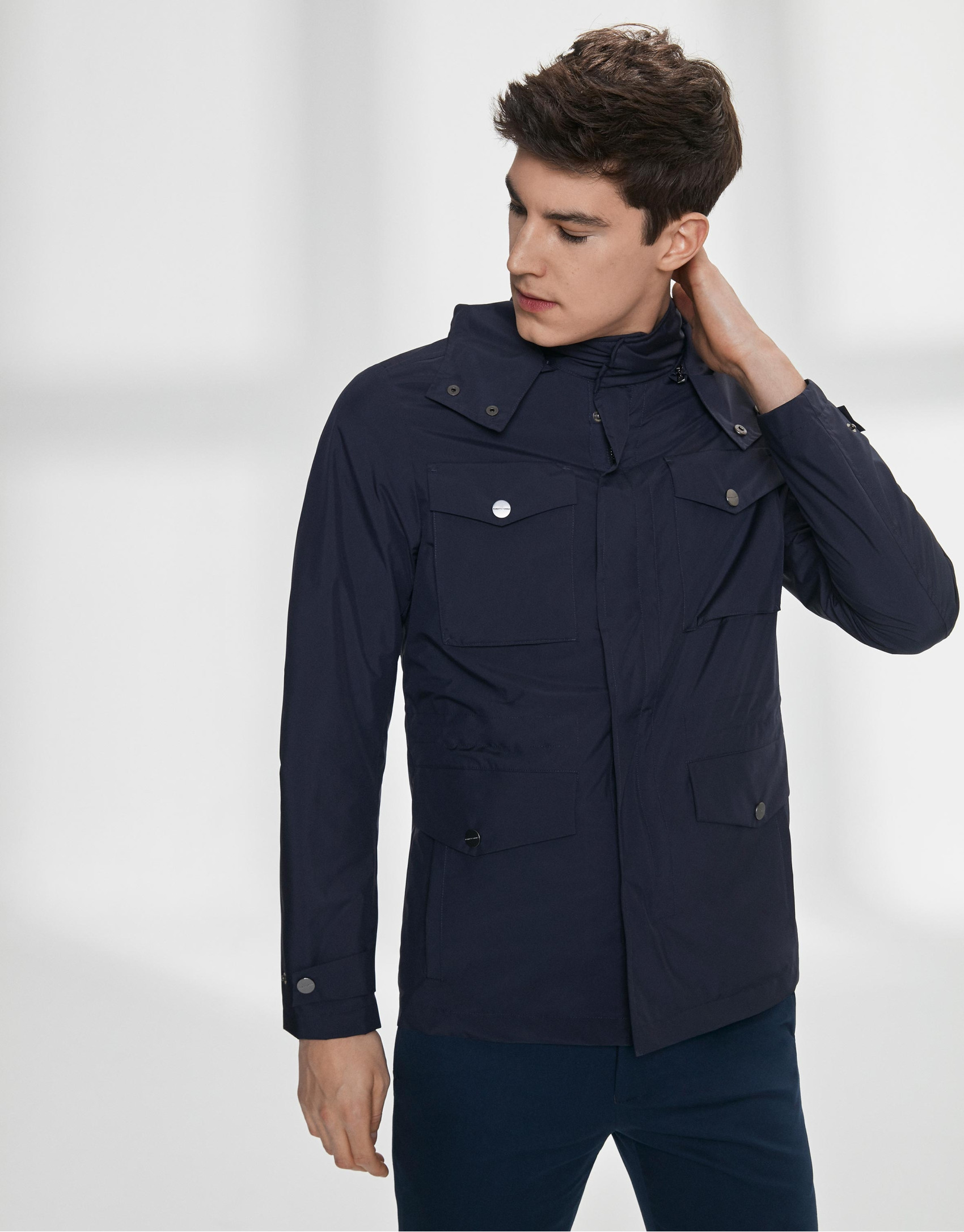 Navy blue parka with four pockets