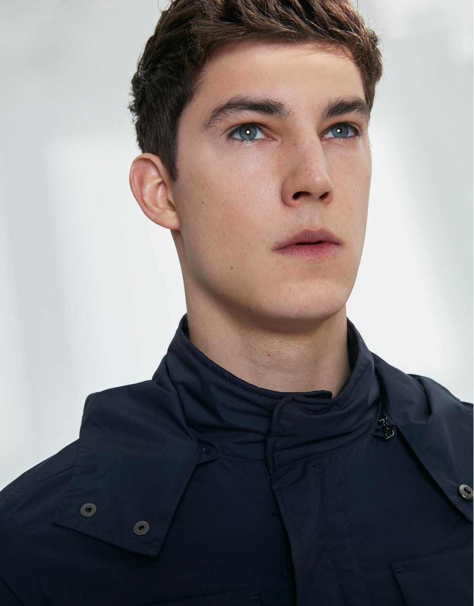 Navy blue parka with four pockets