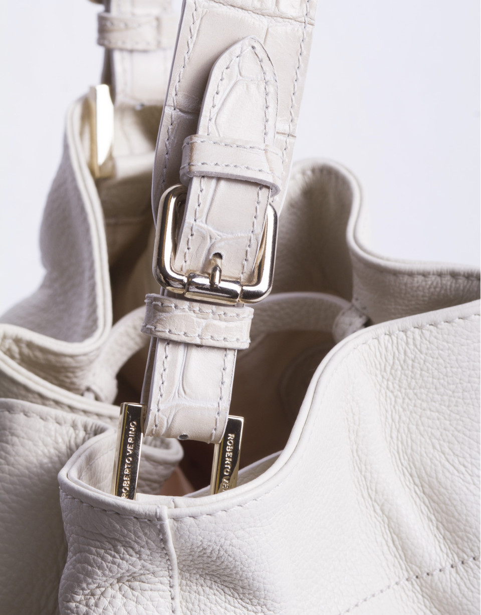 ADAM: Hobo bag with combined raw leathers 