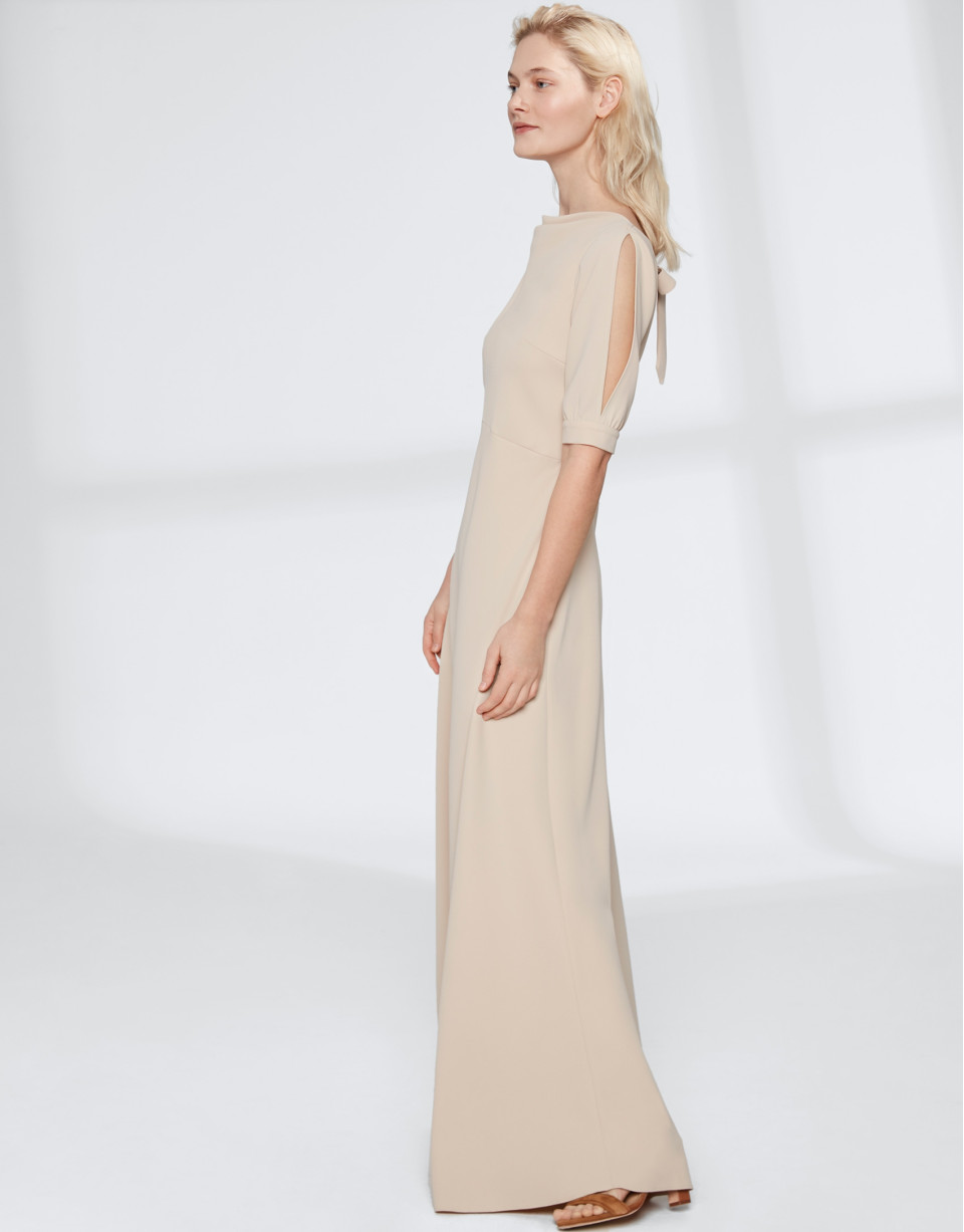 Long, draping, sandy-colored dress 