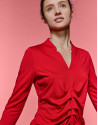 Red top with gathering in front 