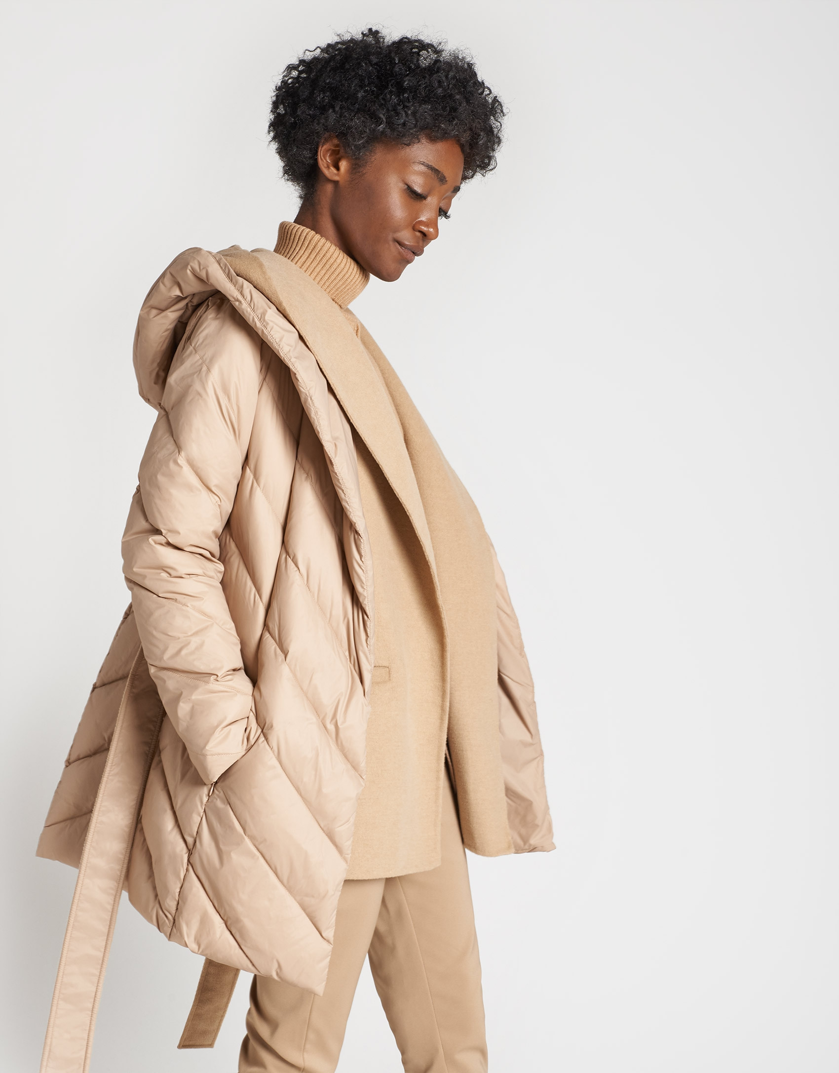 Abrigo acolchado beige con chaleco interior | Roberto Verino