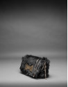 Black rabbit fur Poppy bag with an old gold crystal bow