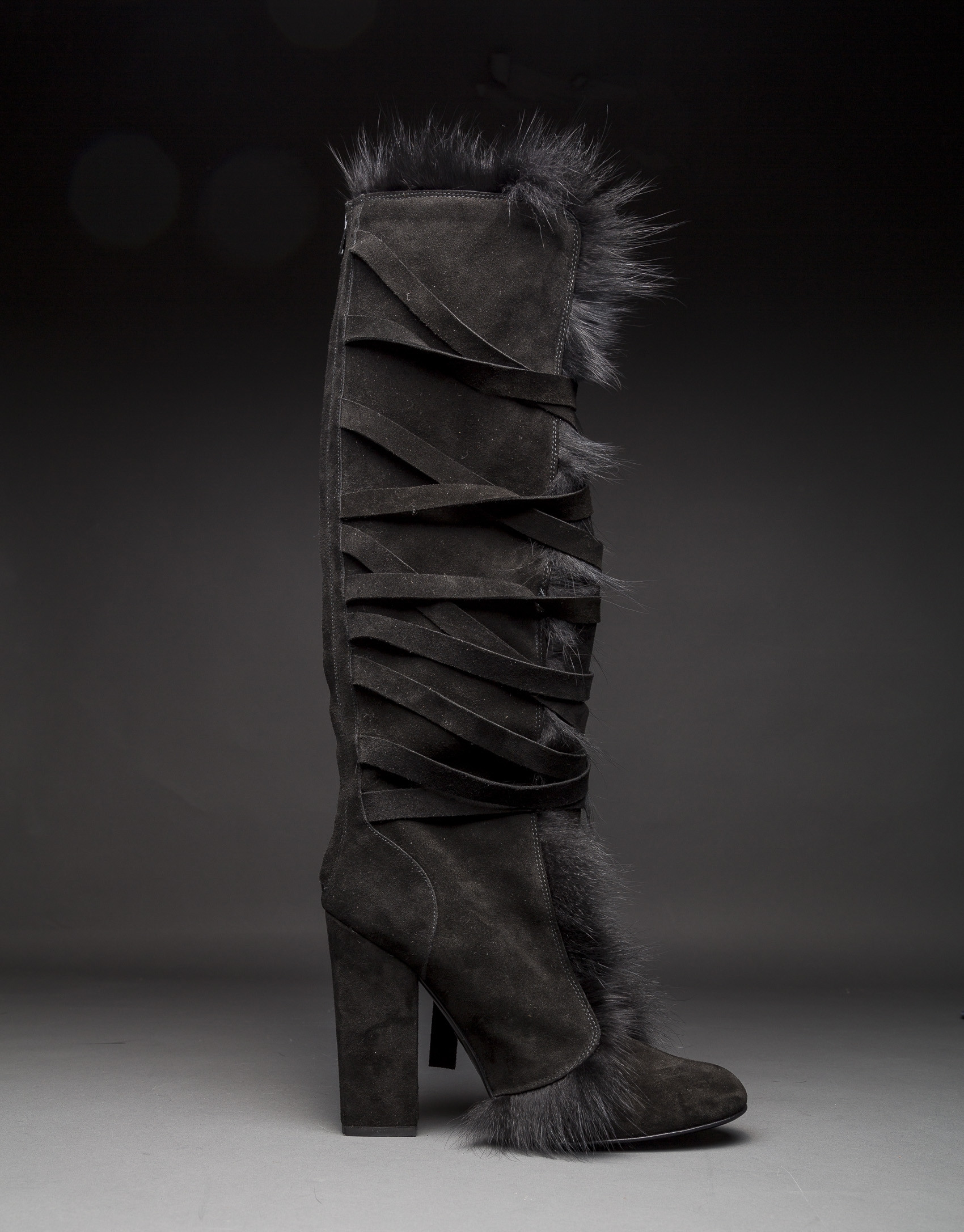 Black suede and fox fur boots.
