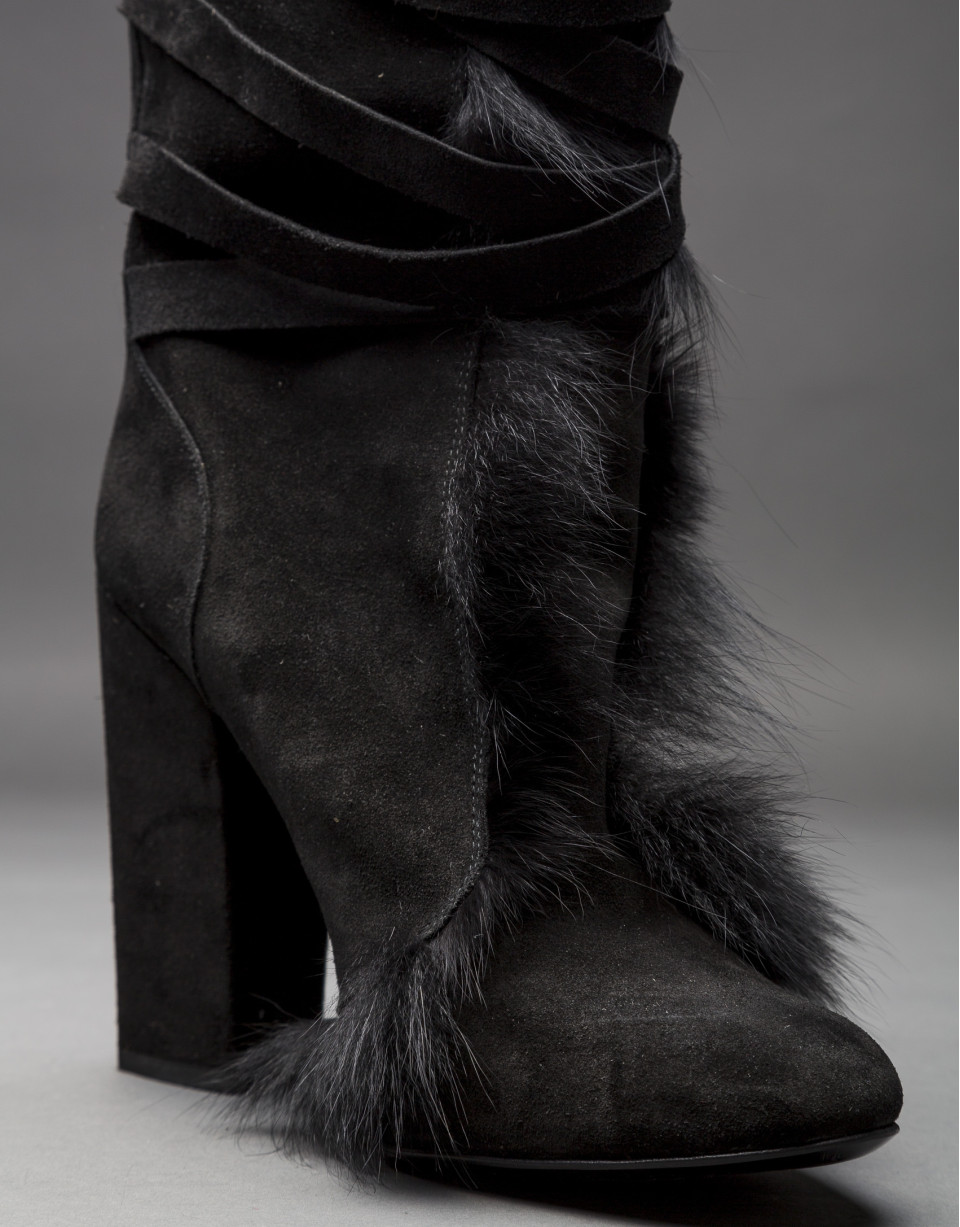 Black suede and fox fur boots.