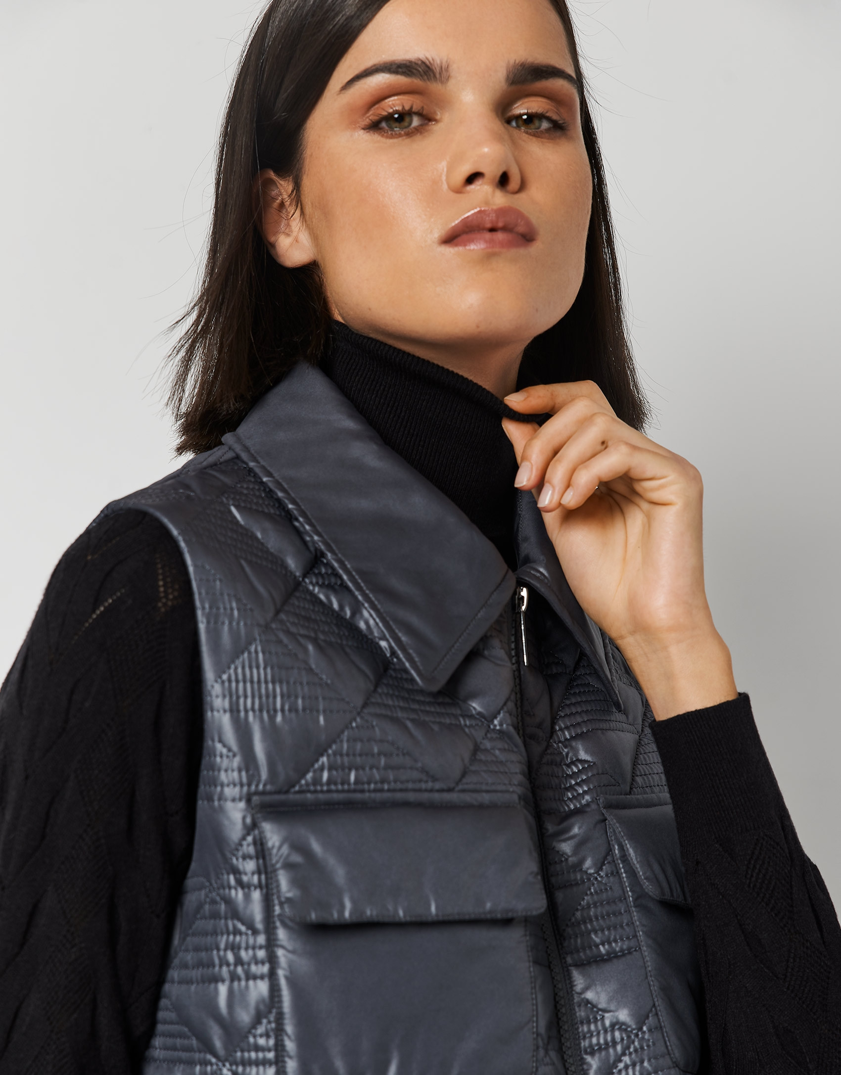 Black tech fabric vest with four pockets | Roberto Verino