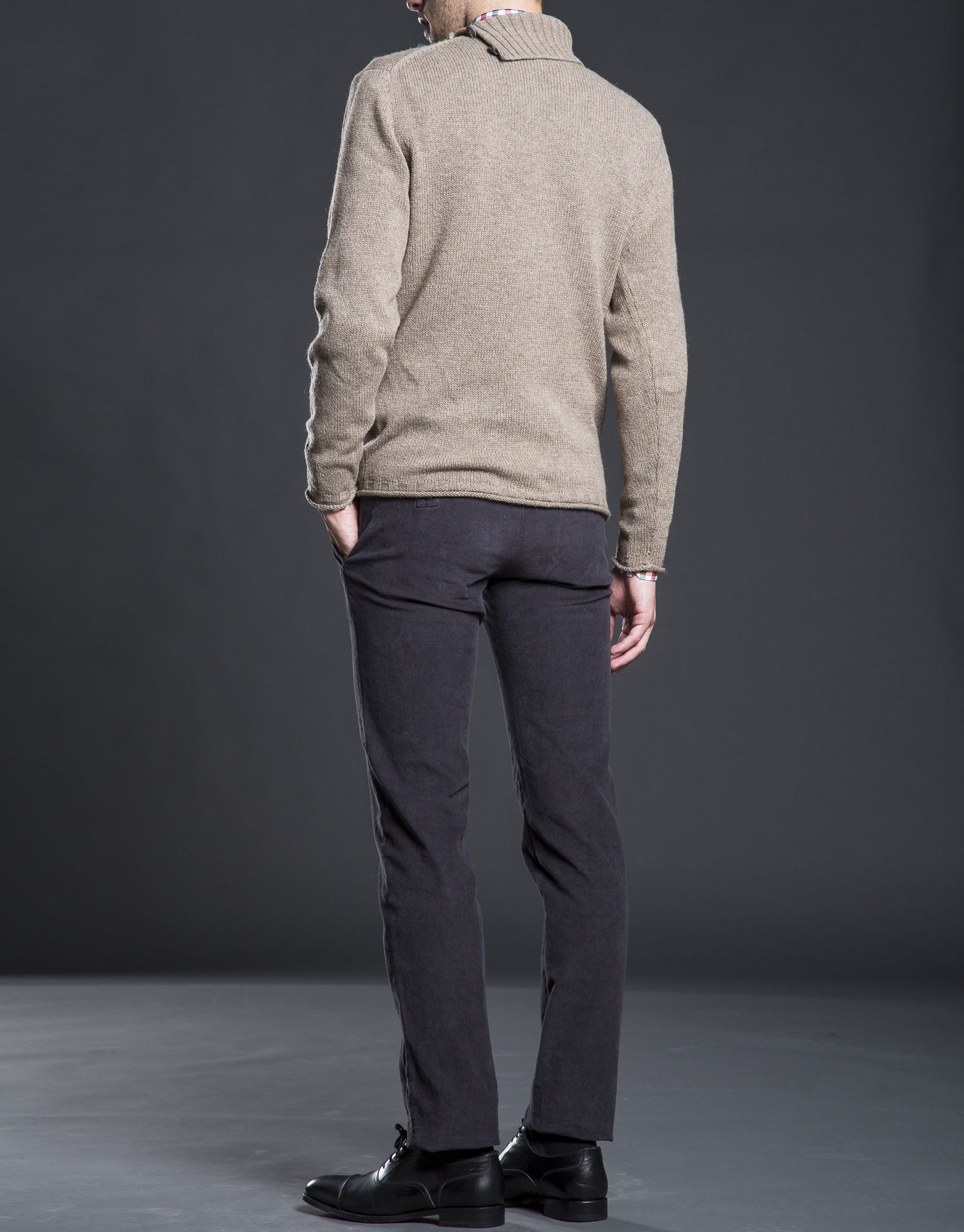 Beige turtle neck sweater with cable-stitching