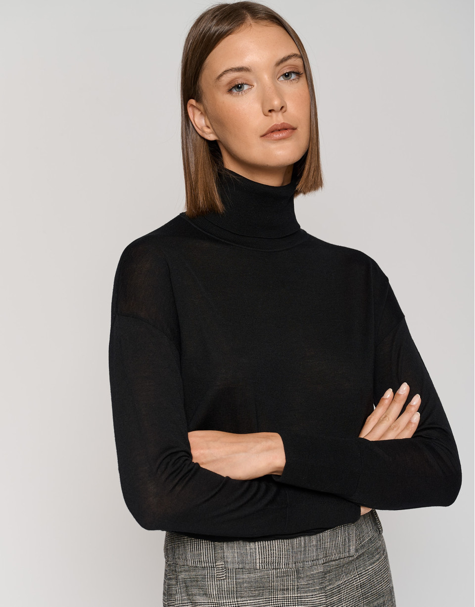 Black fine gauge knit sweater with cowl neckline