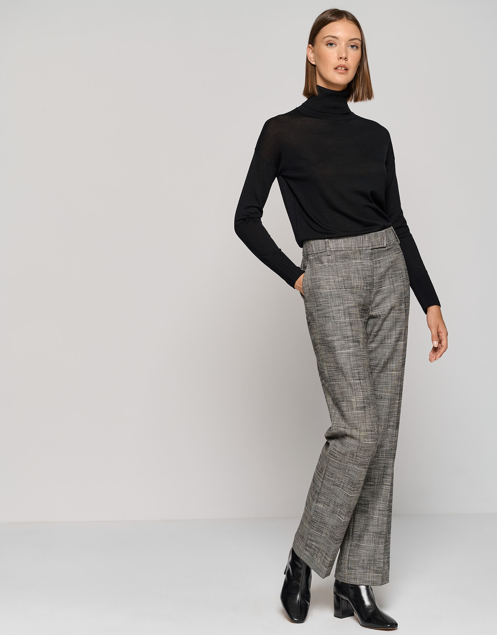 Black fine gauge knit sweater with cowl neckline