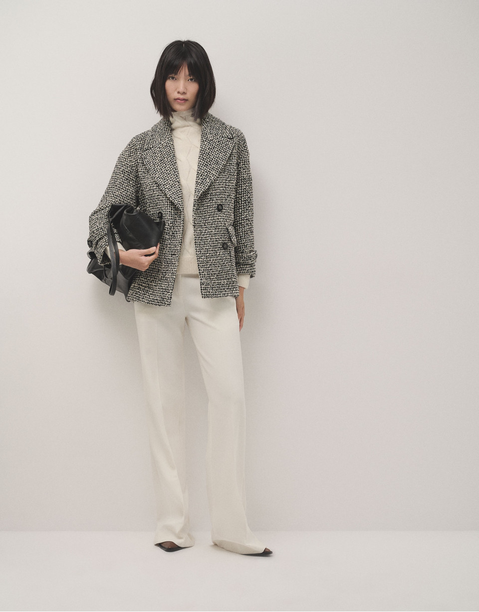 Black and white three-quarter tweed coat