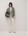 Black and white three-quarter tweed coat