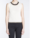 Beige knit top with black and beige trim