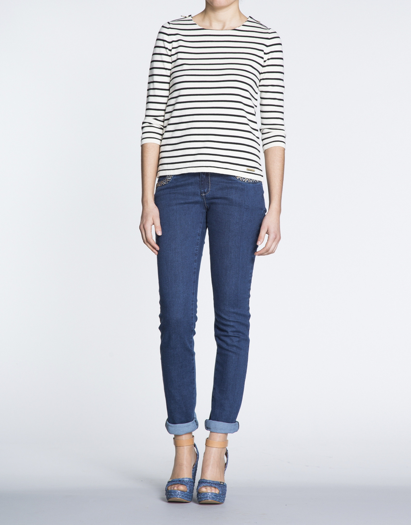 Jersey marinero cremalleras en hombros.