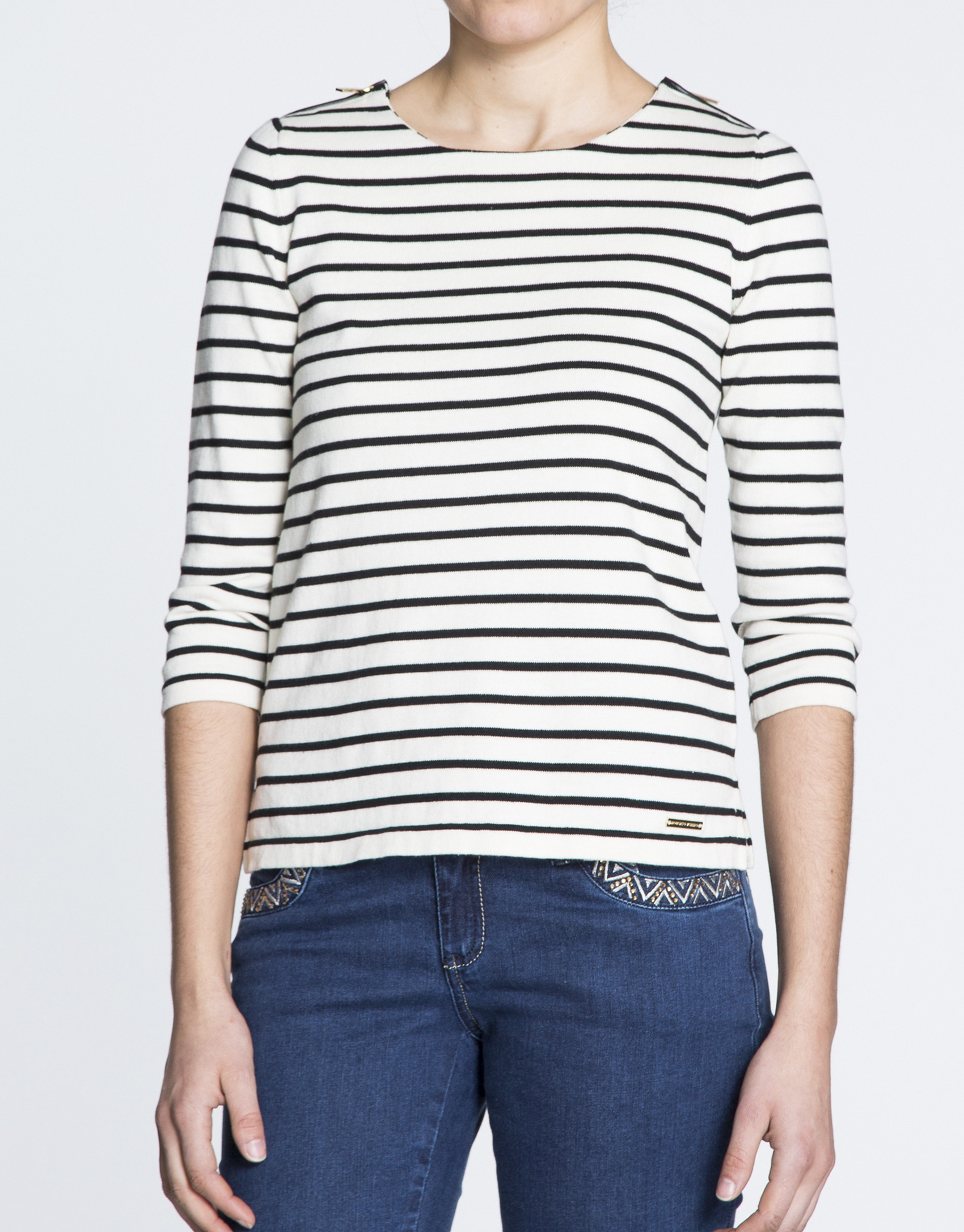 Jersey marinero cremalleras en hombros.