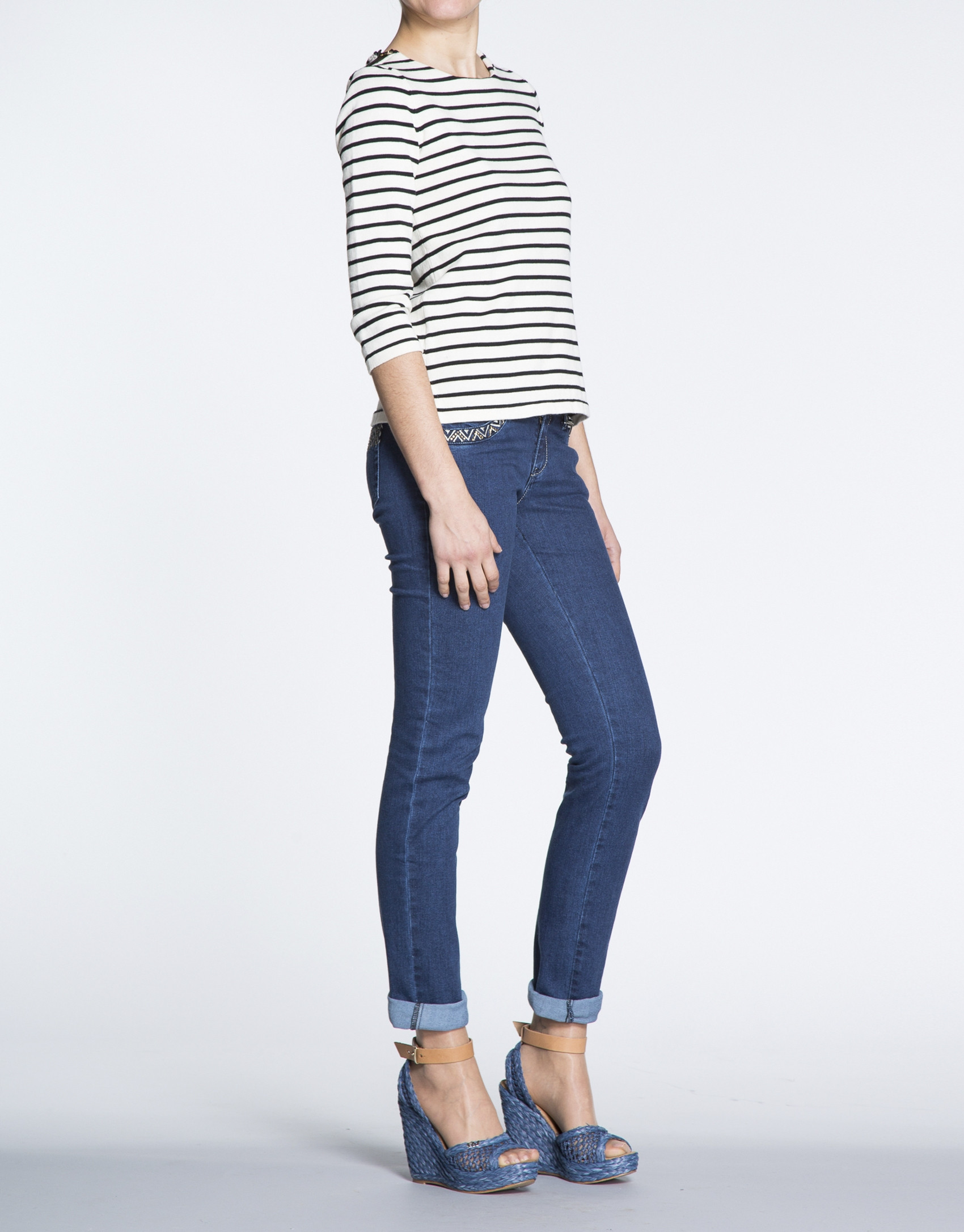 Jersey marinero cremalleras en hombros.