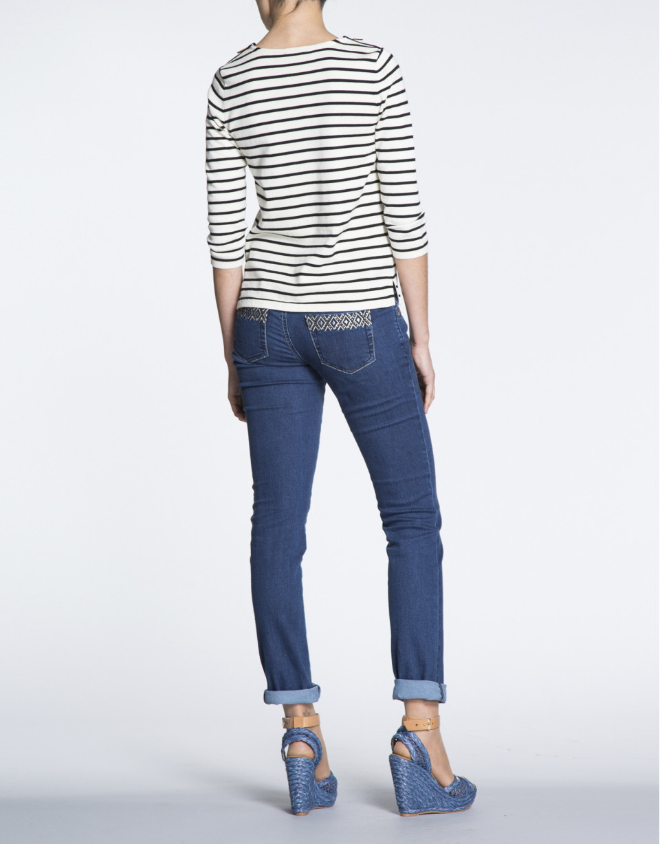 Jersey marinero cremalleras en hombros.