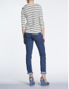 Jersey marinero cremalleras en hombros.