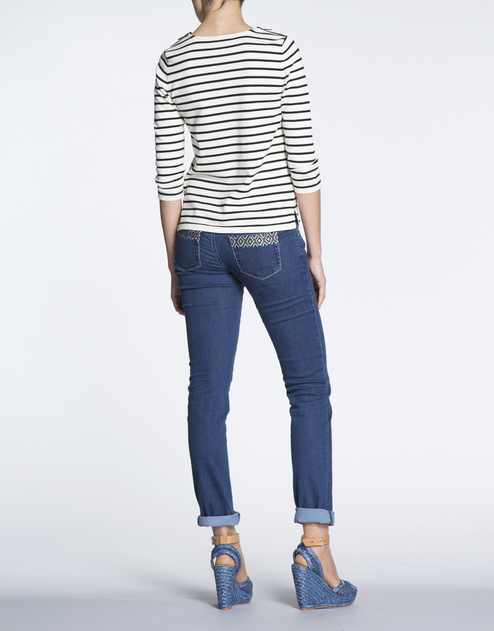 Jersey marinero cremalleras en hombros.