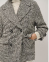 Black and white three-quarter tweed coat | Roberto Verino