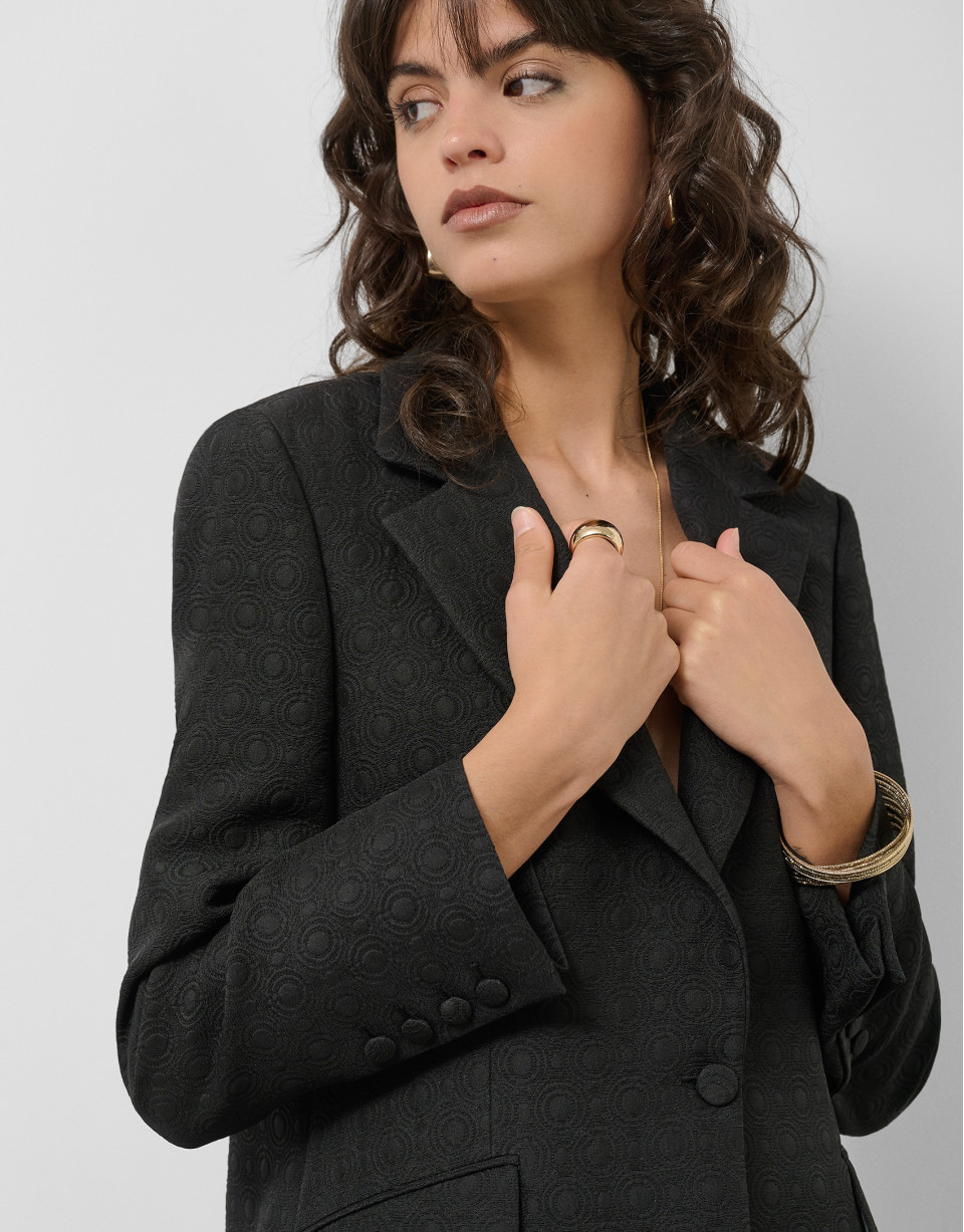 Black blazer with embossed decorative button | Roberto Verino