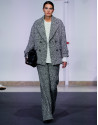 Black and white three-quarter tweed coat