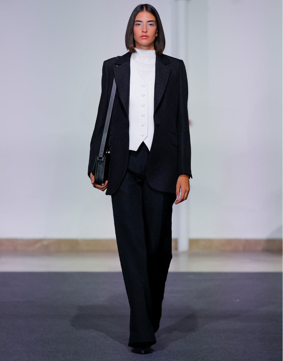 Black blazer with embossed decorative button